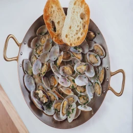 Công thức và cách làm món nghêu xào bơ tỏi